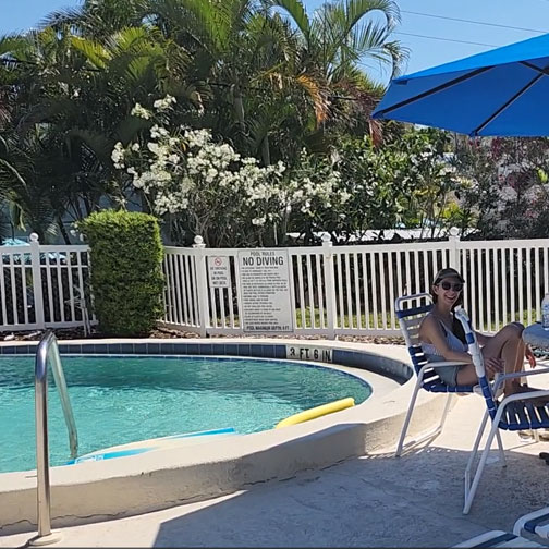 people-sitting-by-the- pool